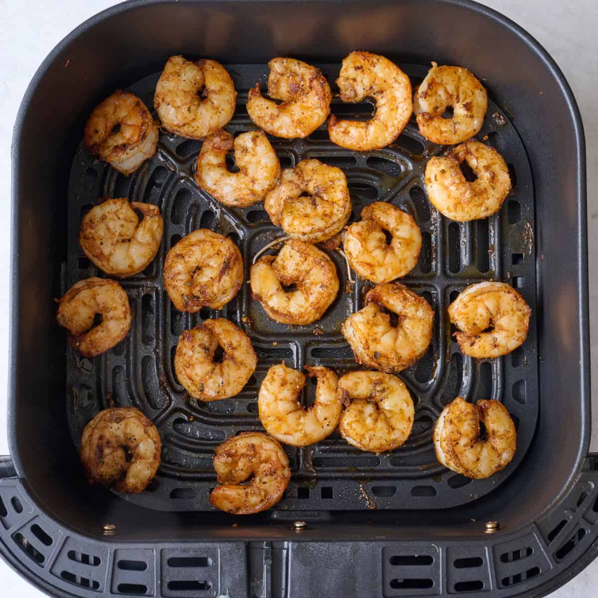 Shrimp after flipped and cooked through.